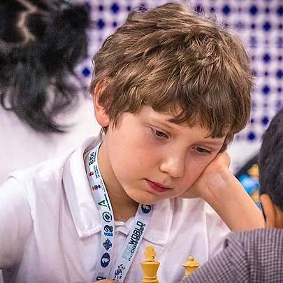 Юний шахіст із Дніпра Мирон Нетребка став чемпіоном світу серед хлопців до 9 років - 412x412
