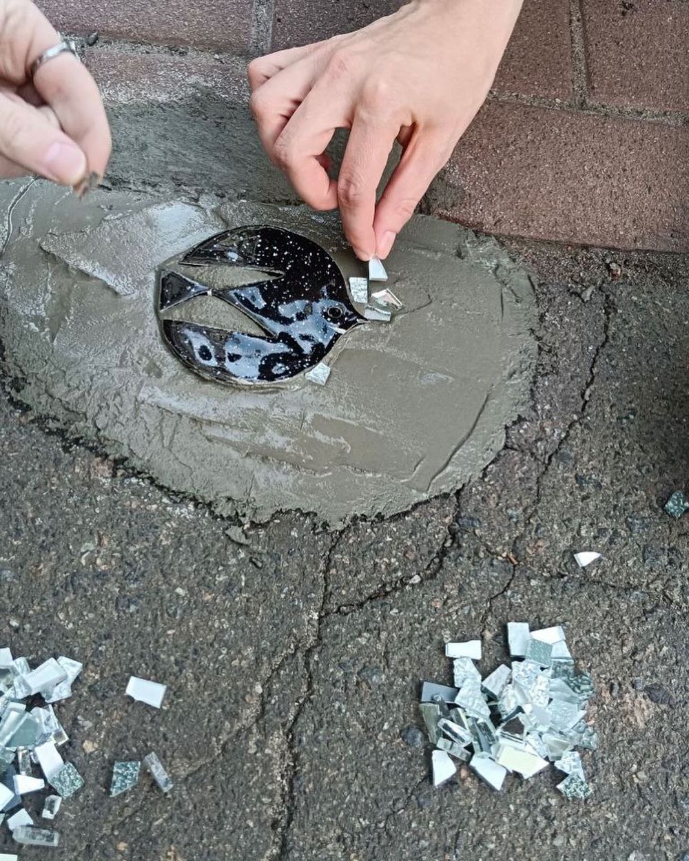 мозаїки в дорожніх ямах